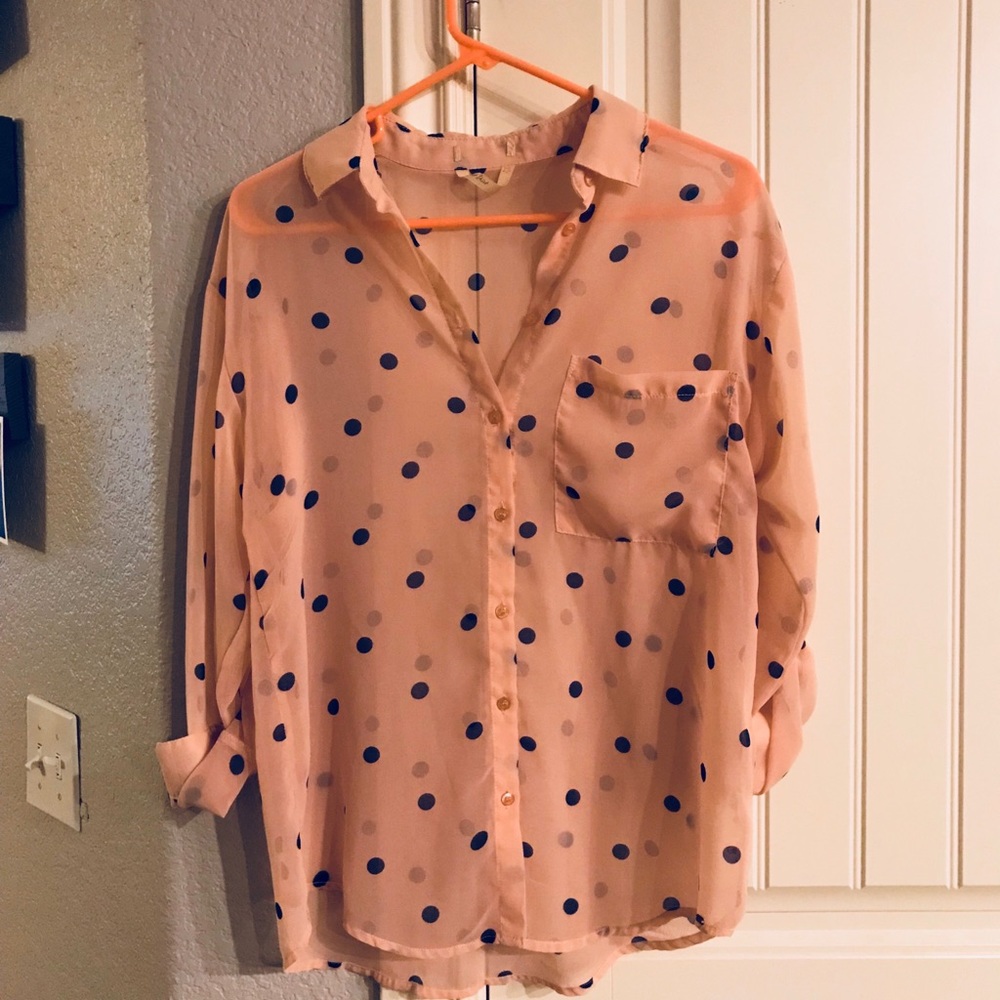 Sheer pink button down blouse with navy polka dots